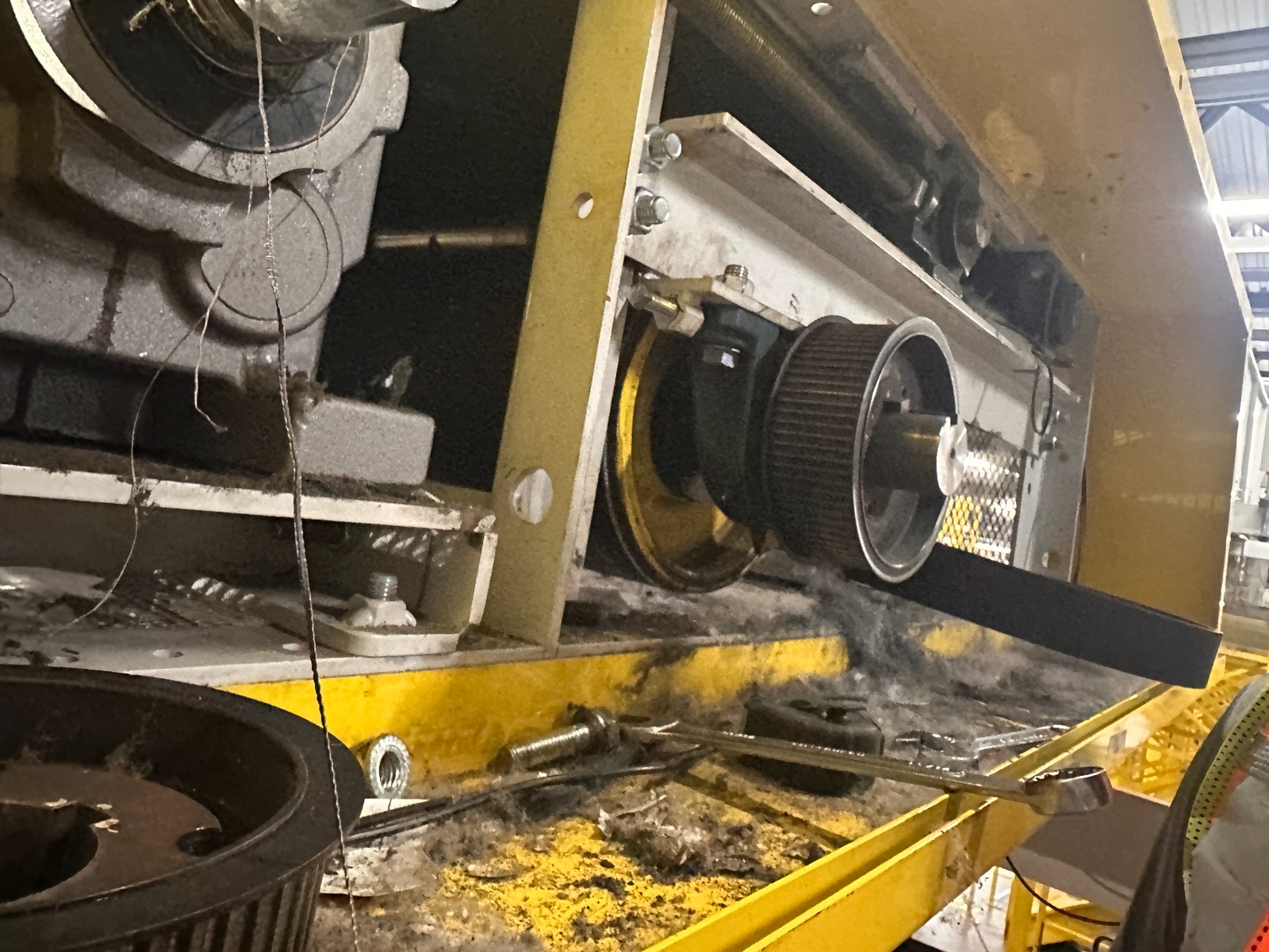 Drive assembly in place on the elevated conveyor during replacement